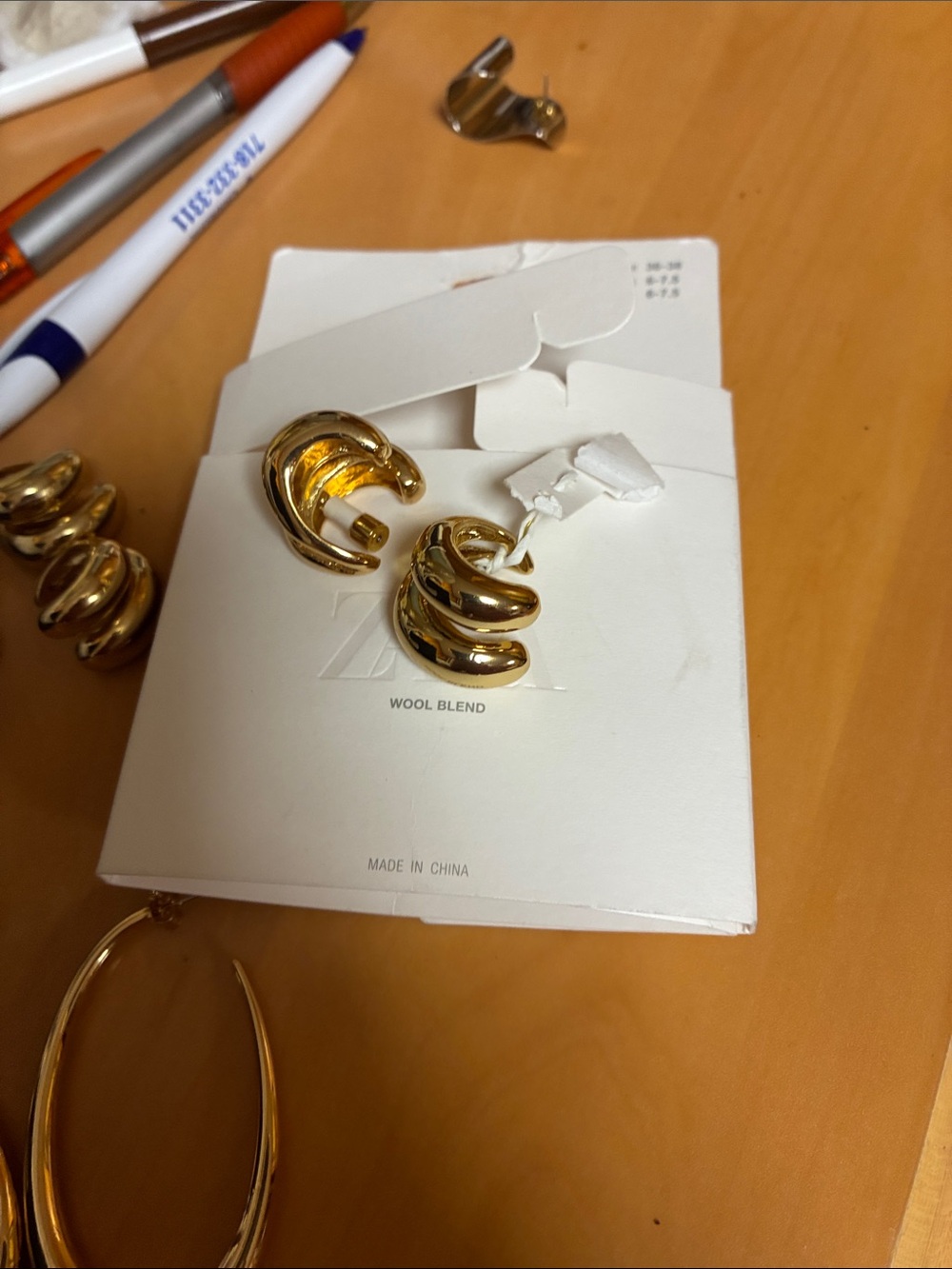 Zara Shiny Gold Twist Hoop Clip-On Earrings